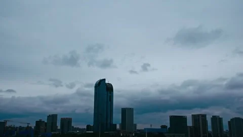 Dark clouds rolled over the city in time Video stock 257060990