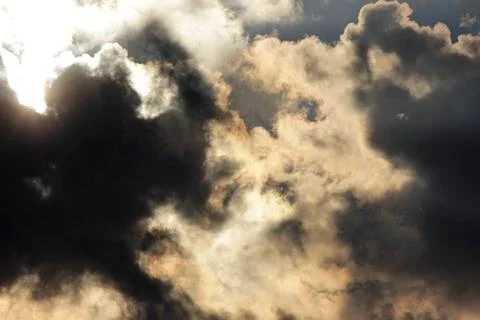 Dark clouds in the sky covered the sun Stock Photos