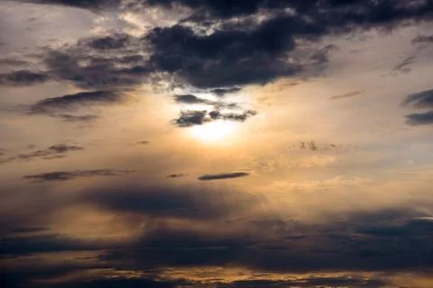 Dark clouds on a sky at sunset Stock Photos