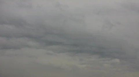 Dark clouds slowly drift in the gloomy sky (High Definition) Stock Footage 69073
