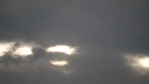 Dark clouds, sunrise - sun, sunbeams - time lapse cloudscape - sky background Stock Footage 151628692