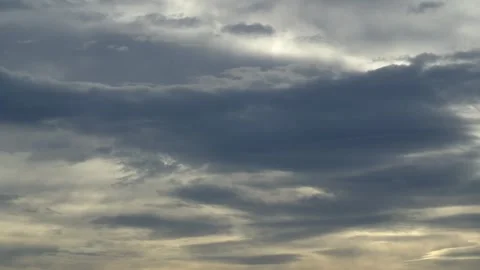 Dark Clouds at sunrise timelapse Stock Footage 256882629