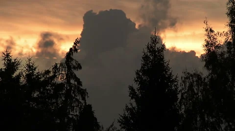 Dark clouds at sunset Stock Footage 55796401