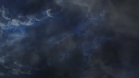 Dark Clouds, Thunder, and Lightning in dark sky 4k Stock Footage 276721183