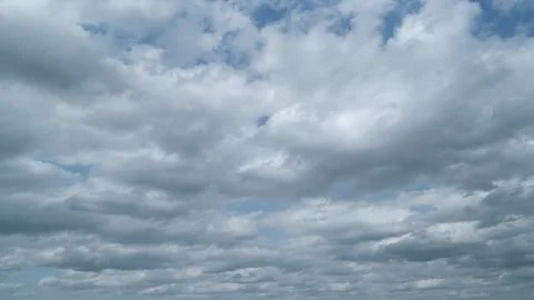Dark clouds before thunder storm coming. Dramatic cloudy rainy sky. Timelapse. Stock Photos