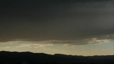 Dark clouds timelapse, mega storm over the city Stock Footage 135347168