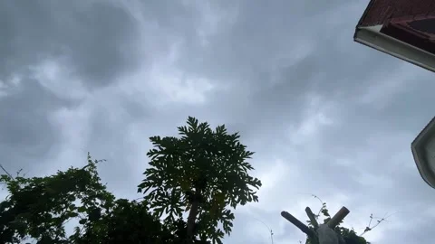 Dark Clouds Timelapse Sky | Black Silhouette Trees and Buildings Видео 315373046