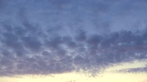 Dark clouds, very cloudy sky at sunrise - background, cloudscape - time lapse Stock Footage 144265567