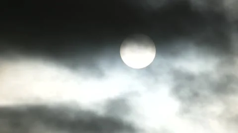 Dark clouds, white sun, mystical sunlight, sunrise - sky background - Time Lapse Stock Footage 154632016