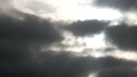 Dark clouds, white sun, mystical sunlight, sunrise - sky background - Time Lapse Stock Footage 154634122