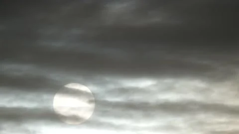 Dark clouds, white sun, mystical sunlight, sunrise - sky background - Time Lapse Stock Footage 154752178
