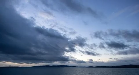 Dark Cloudscape over the West Coast of Pacific Ocean. Stock Photos