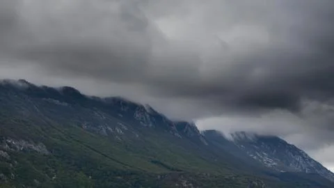 Dark cloudy sky over mountain landscape on a stormy day Fotos Stock