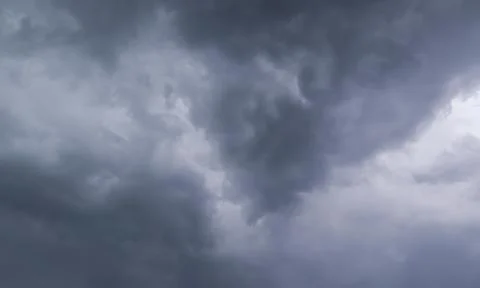 Dark Cloudy Sky Before Rain with Dramatic Overcast Atmosphere Stock Photos