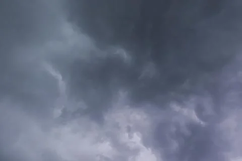 Dark Cloudy Sky Before Rain with Dramatic Overcast Atmosphere Stock Photos