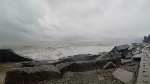 Dark cloudy stormy sky with clouds and waves in the sea - global warming concept 스톡 동영상 48947256