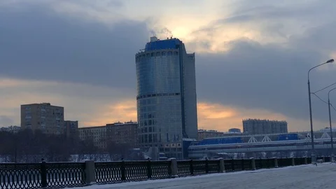 Dark Cloudy Sunset over Office Block Stock Footage 76389314
