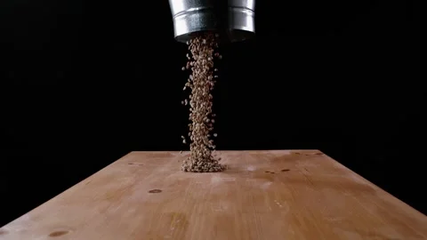 The Dark Coffee Beans Are Poured On The Table Stock Footage 254997828