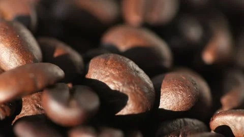 Dark coffee beans. Rotation. Coffee beans. Close up of coffee seeds. Beautiful Stock Footage 270314328