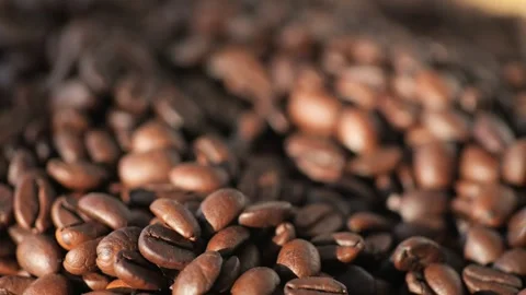 Dark coffee beans. Rotation. Coffee beans. Close up of coffee seeds. Beautiful Stock Footage 270540919