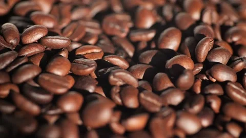 Dark coffee beans. Rotation. Coffee beans. Close up of coffee seeds. Beautiful Stock Footage 270540924