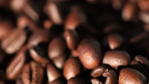 Dark coffee beans. Rotation. Coffee beans. Close up of coffee seeds. Beautiful Stock Footage 270541021