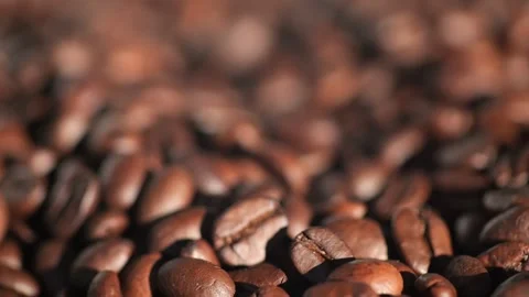 Dark coffee beans. Rotation. Coffee beans. Close up of coffee seeds. Beautiful Stock Footage 270961101