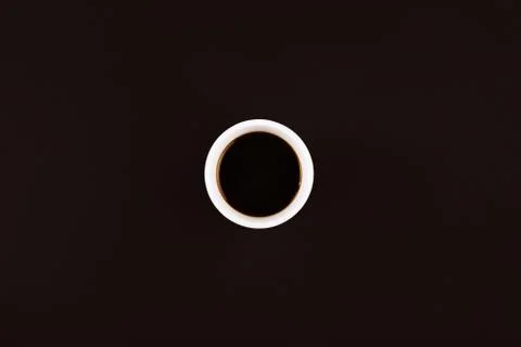Dark coffee on dark background Stock Photos