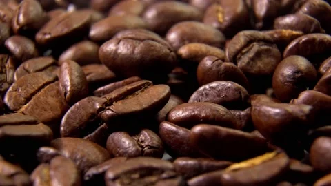 Dark Coffee Grains. Coffee beans. Close up of seeds of cof Stock Footage 163997308