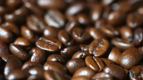 Dark Coffee Grains. Rotating. Coffee beans. Close up of seeds of coffee Vídeo Stock 134748963