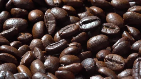 Dark Coffee Grains. Rotating. Coffee beans. Close up of seeds of coffee 스톡 동영상 135039015