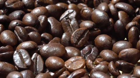 Dark Coffee Grains. Rotating . Coffee beans. Close up of seeds of coffee Stock Footage 135099032