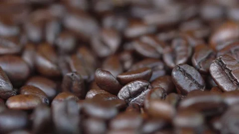 Dark Coffee Grains. Rotating . Coffee beans. Close up of seeds of coffee Stock Footage 135551189