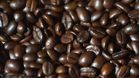Dark Coffee Grains. Rotating. Coffee beans. Close up of seeds of coffee Stock Footage 136238410