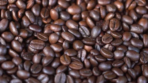 Dark Coffee Grains. Rotating. Coffee beans. Close up of seeds of coffee Stock Footage 137683803