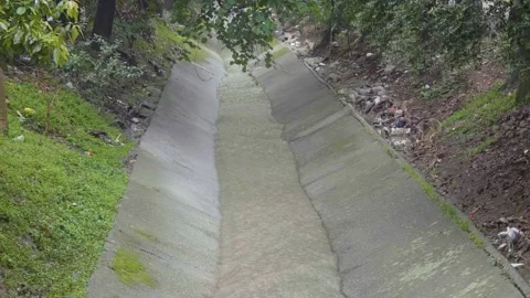 Dark-Colored River like Water Pipeline Stock Footage 151024808