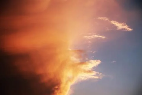 Dark colorful dramatic sunset sky with purple, orange, pink and blue colors Stock Photos