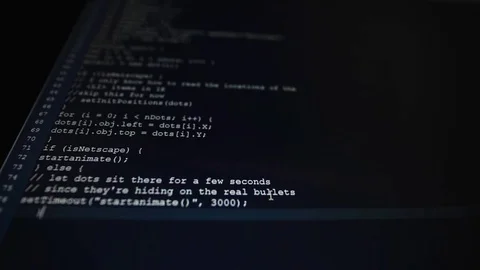 On a dark computer screen typing, probably some programmer type on the keyboard Stock Footage