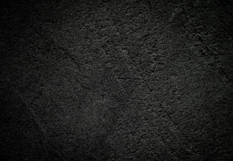 Dark concrete wall texture Background with copy space for text or design Foto stock