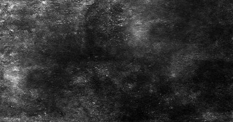 Dark concrete wall texture with cracks, scratches, and grunge stains, creatin Stock Photos