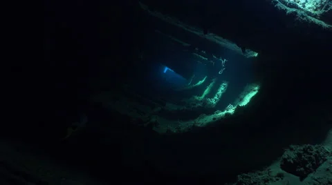 Dark corridor inside the shipwreck with magical sun rays - Umbria, Sudan Stock Footage 61144209