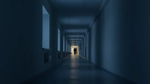 Dark Corridor with an Intriguing Light Source at the End of the Passageway Stock Footage 294105365