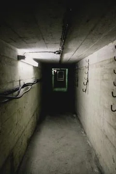 Dark corridor of old abandoned Soviet underground bunker. Defocused Foto stock