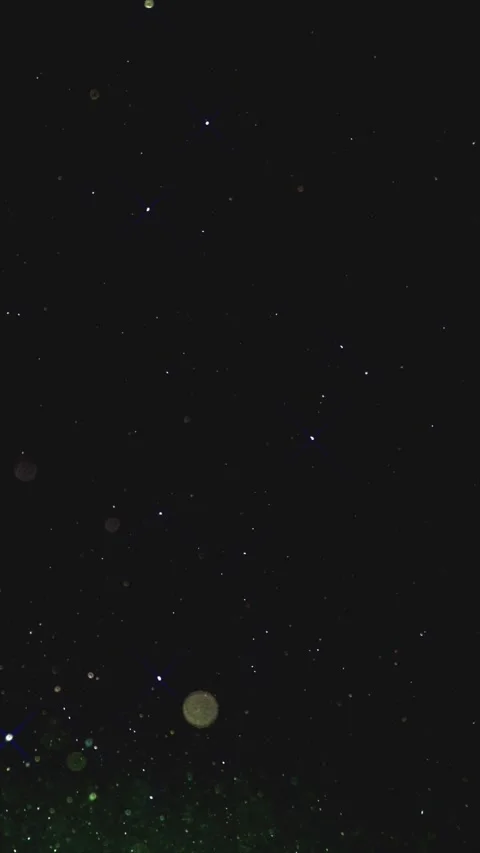 Dark Cosmic Sky Background with Blue Stars and Green Particle Fog 스톡 동영상 338303645