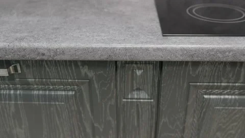 Dark countertops and kitchen cabinets. Stock Footage 224738171
