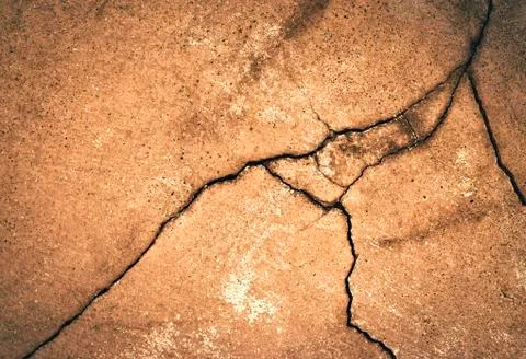 A dark crack on the old plaster Stock Photos