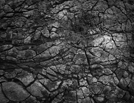 Dark crack stone background. Stock Photos