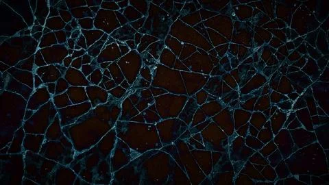 A dark cracked stone texture with deep blue and black tones, offering a bol.. イラスト素材