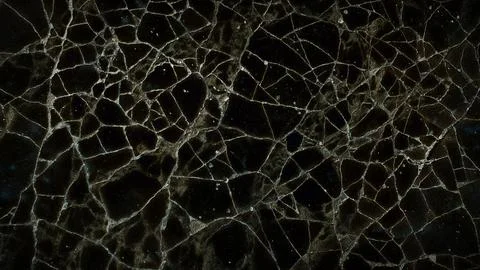 Dark cracked stone texture with deep black and earthy brown tones, creating.. Illustrazione stock