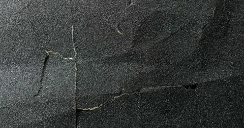 Dark cracked texture slow rotation. 動画素材 336911385
